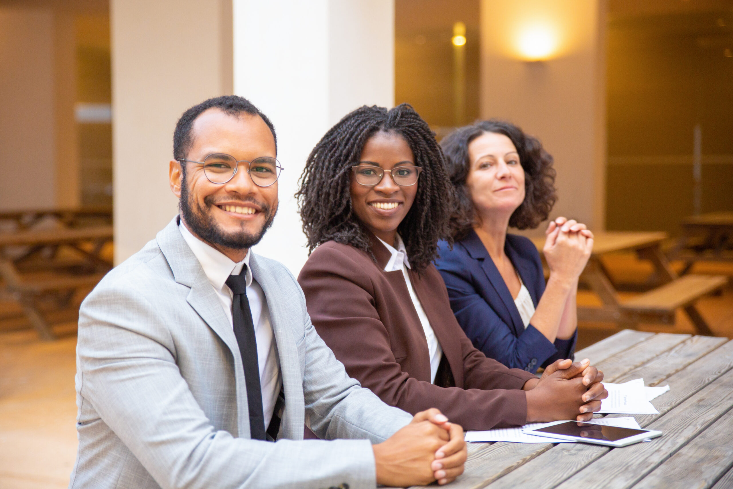 Professionals seated together at a meeting